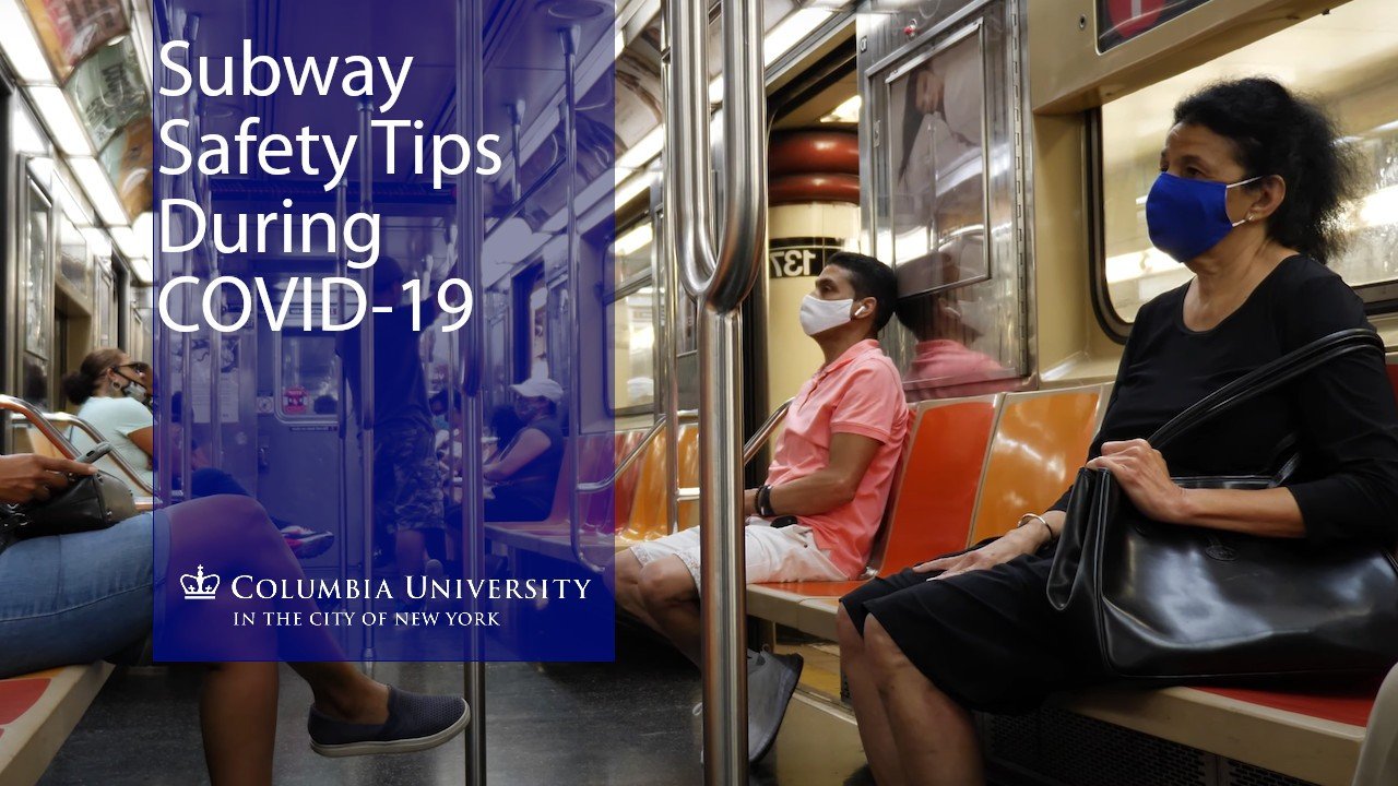 People wearing masks as they ride the NYC Subway 